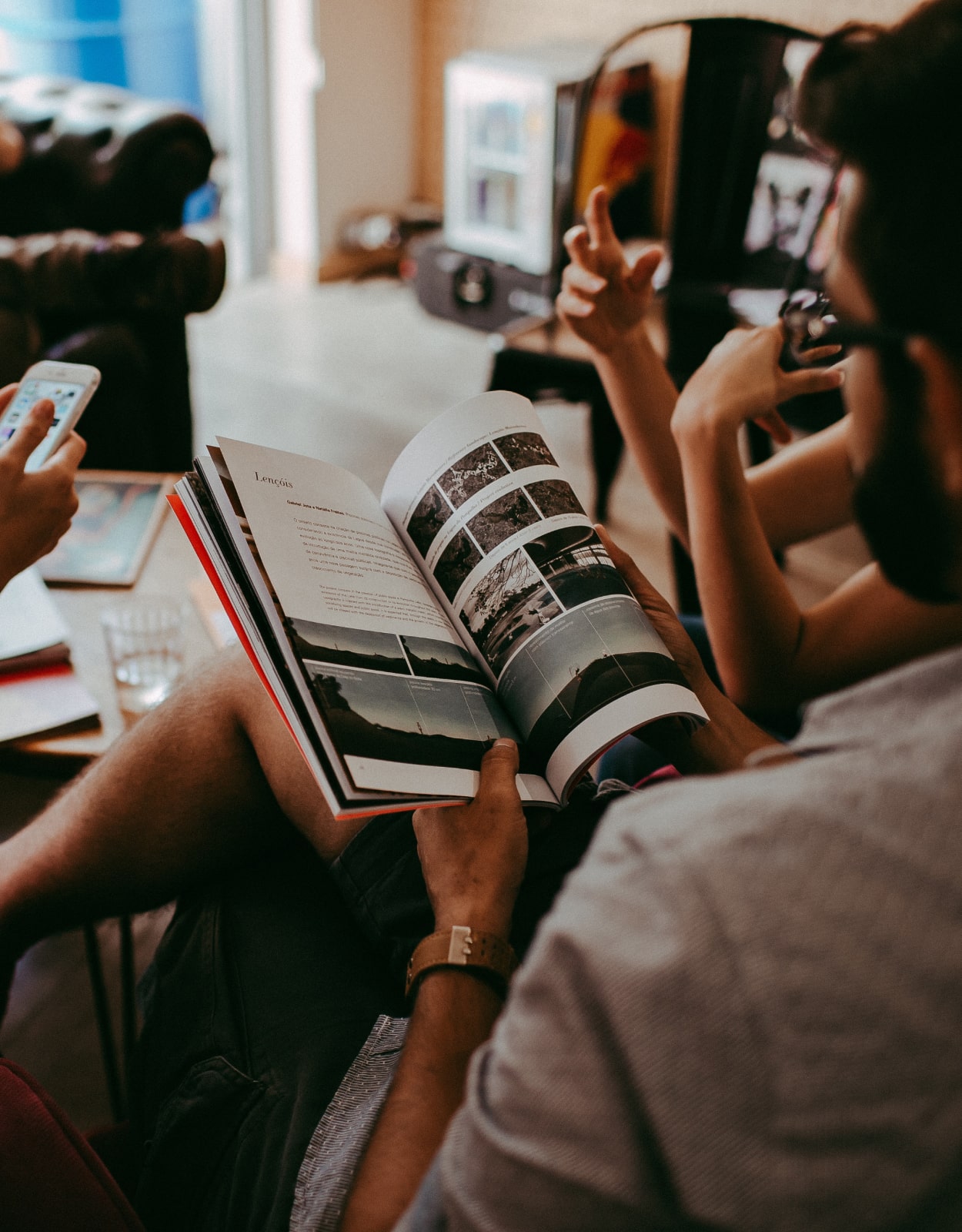 group-of-people-reading-book-sitting-on-chair-711009 3-min